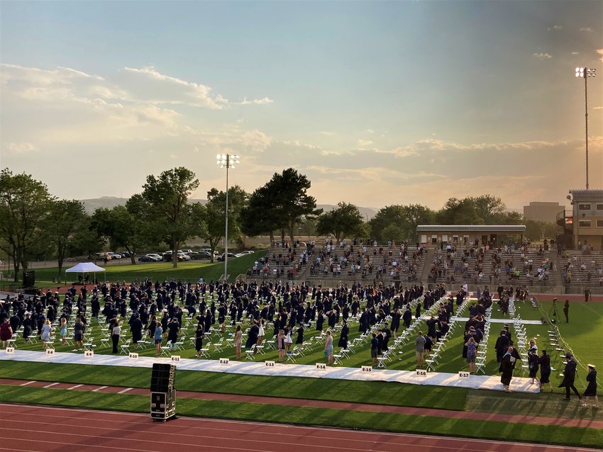 Graduates were spaced apart on the field at Jeffco Stadium during Columbine High School's graduation.